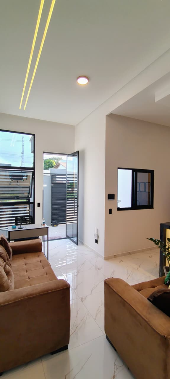 Sala de espera moderna da Clínica Acolher